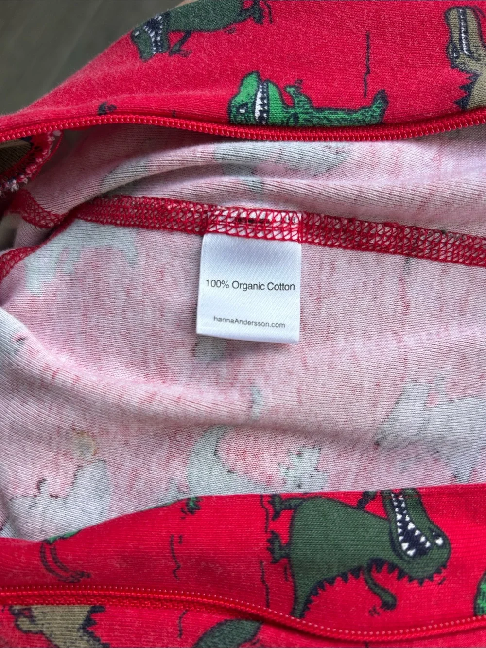 Hanna Andersson Dinosaur and Dragon patterned zip footie pajamas